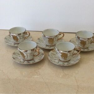 Vintage Sterling China 5 Demitasse cups and saucers.